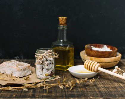 organic-soap-bar-with-ingredients-dark-background